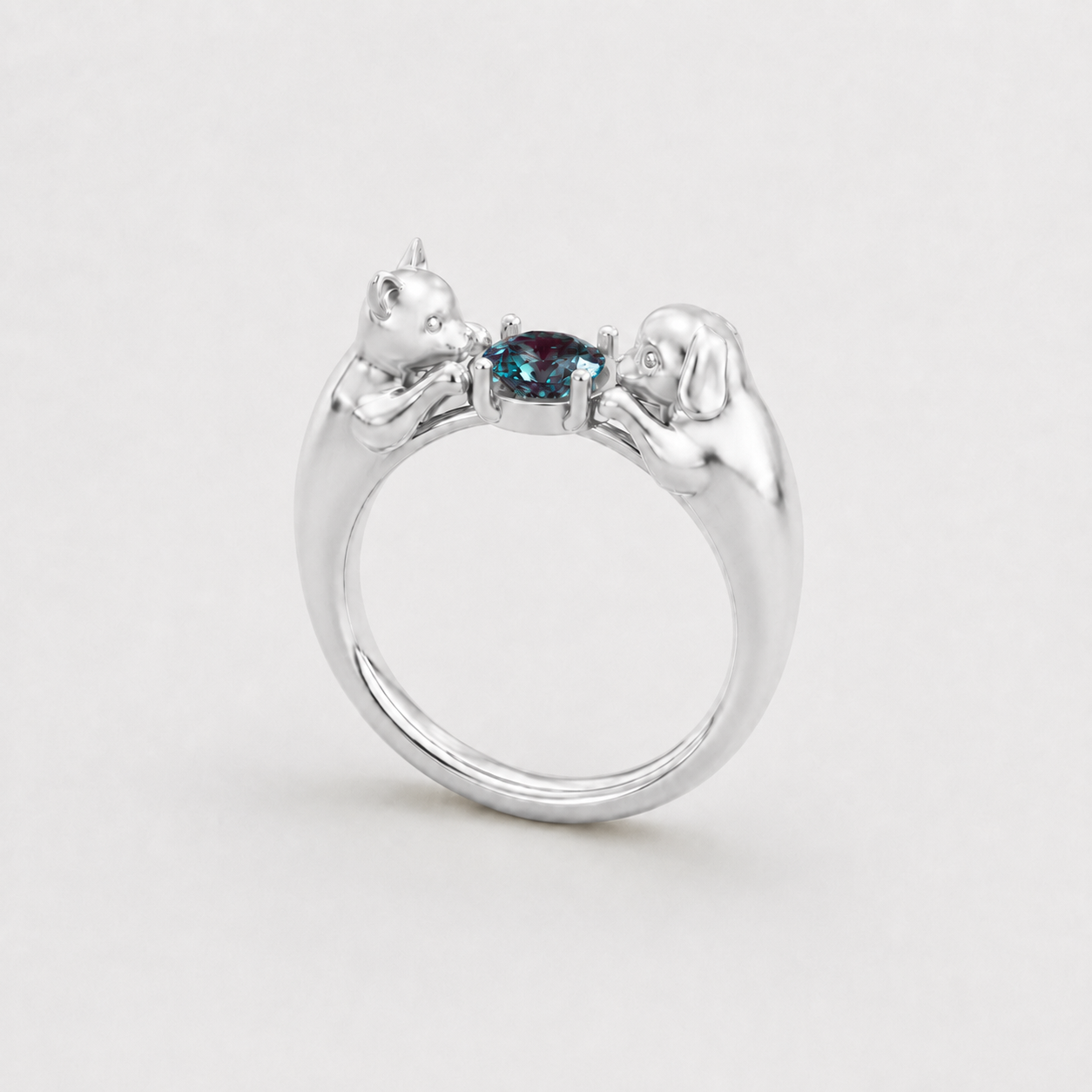 Custom story ring with a lab-grown alexandrite and a cat-and-dog design — Heiracle