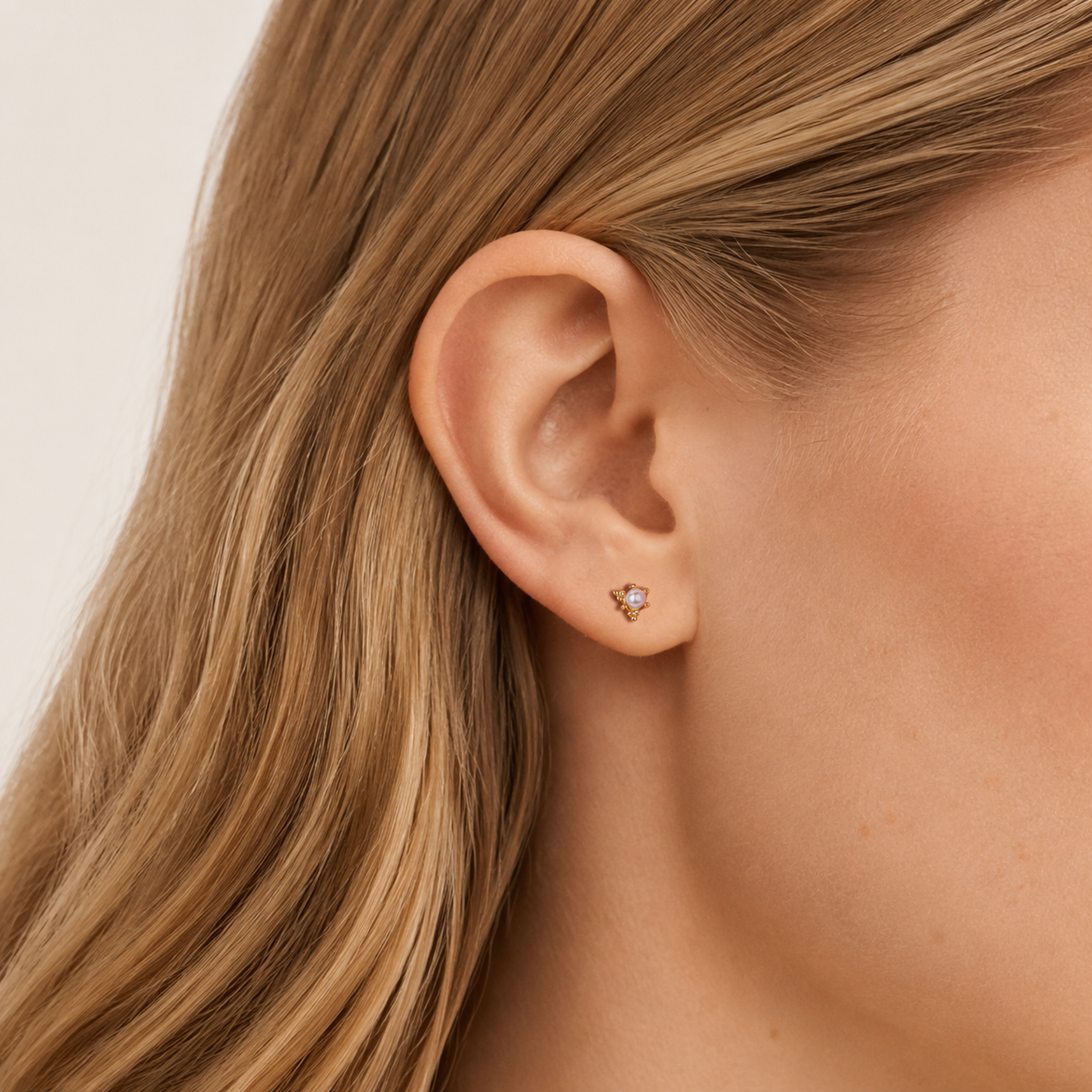 Sterling Silver Freshwater Pearl Stud Earrings worn on the ear