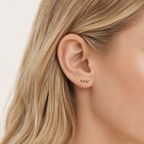 Sterling Silver Zirconia Rake Stud Earrings worn on the ear