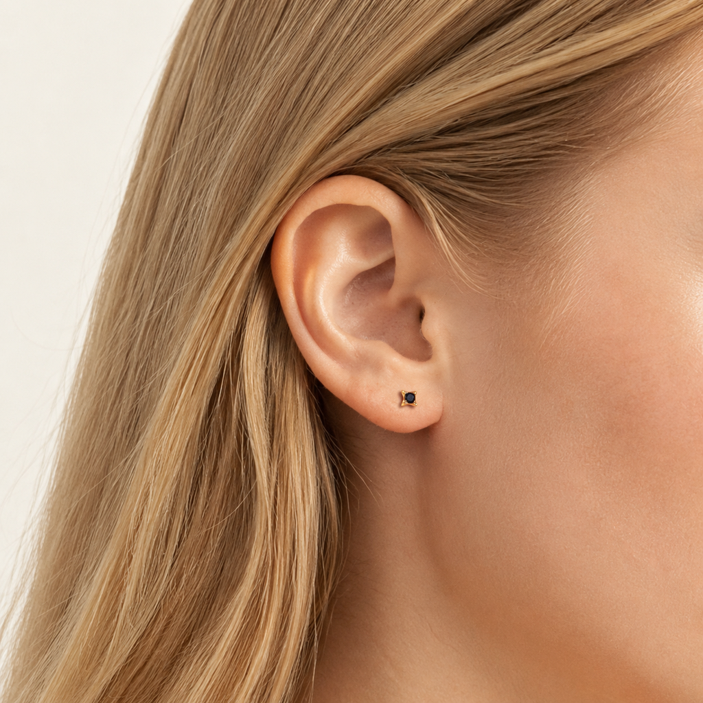 Sterling Silver Black Zirconia Stud Earrings worn on the ear