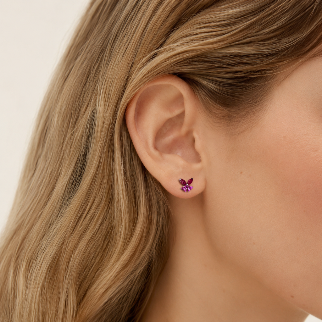 Sterling Silver Zirconia Butterfly Stud Earrings worn on the ear