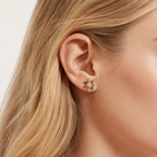 Sterling Silver Flower Pearl Stud Earrings worn on the ear