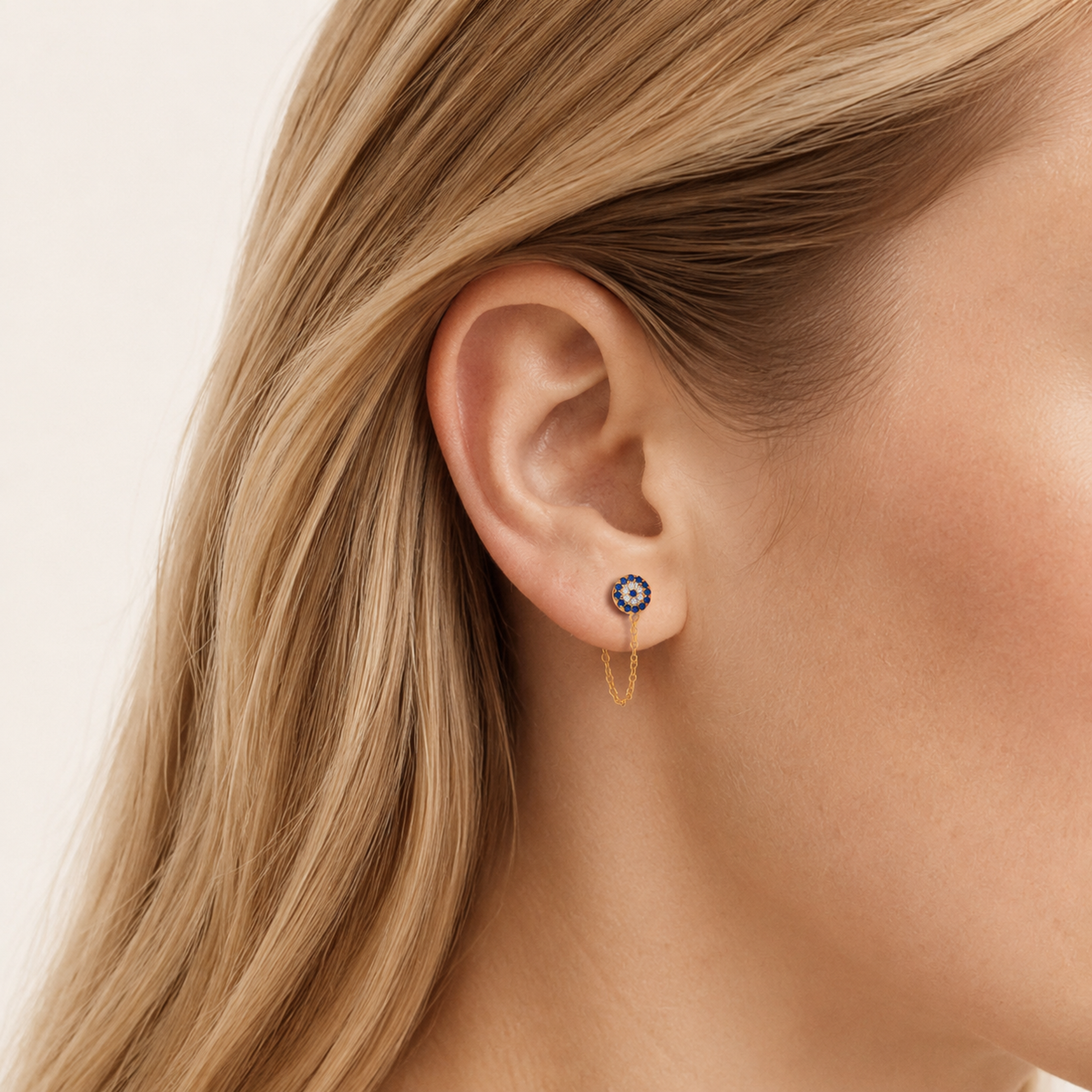 Sterling Silver Evil Eye Zirconia Chain Drop Stud Earrings worn on the ear