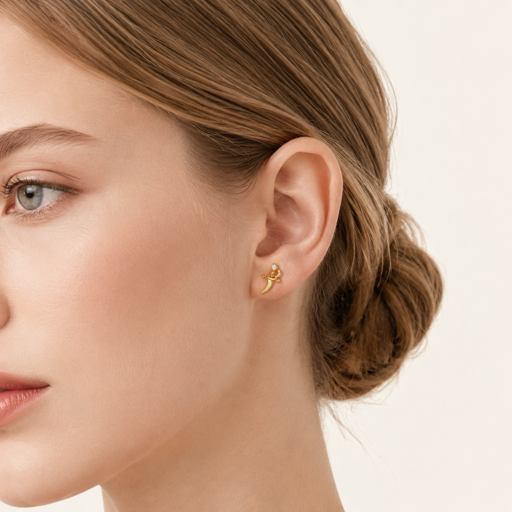 Sterling Silver Zirconia Dagger Stud Earrings worn on the ear