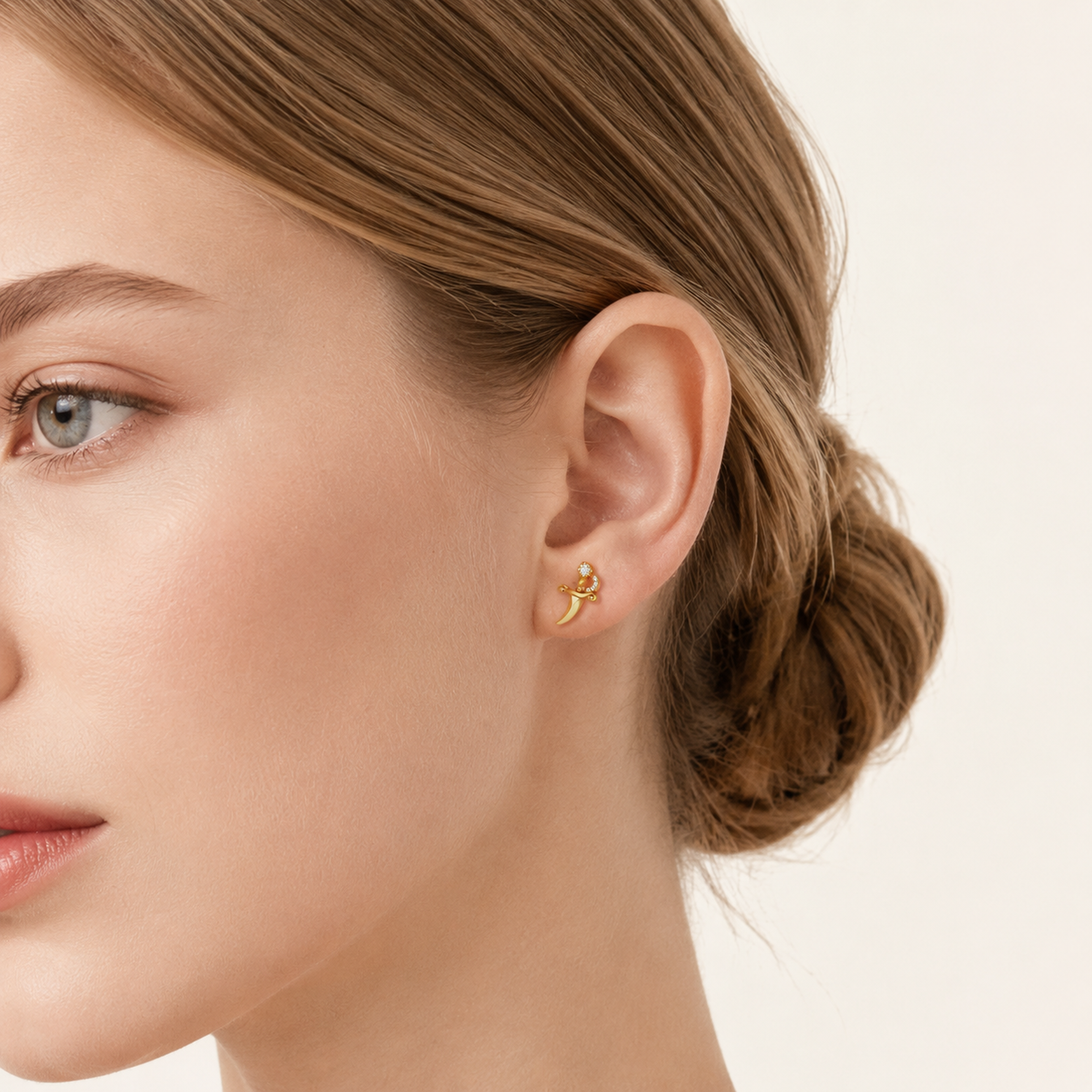 Sterling Silver Zirconia Dagger Stud Earrings worn on the ear