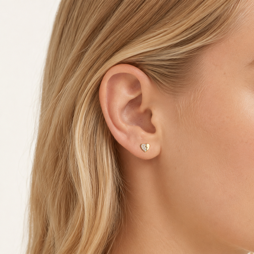 Sterling Silver Zirconia Heart Stud Earrings worn on the ear