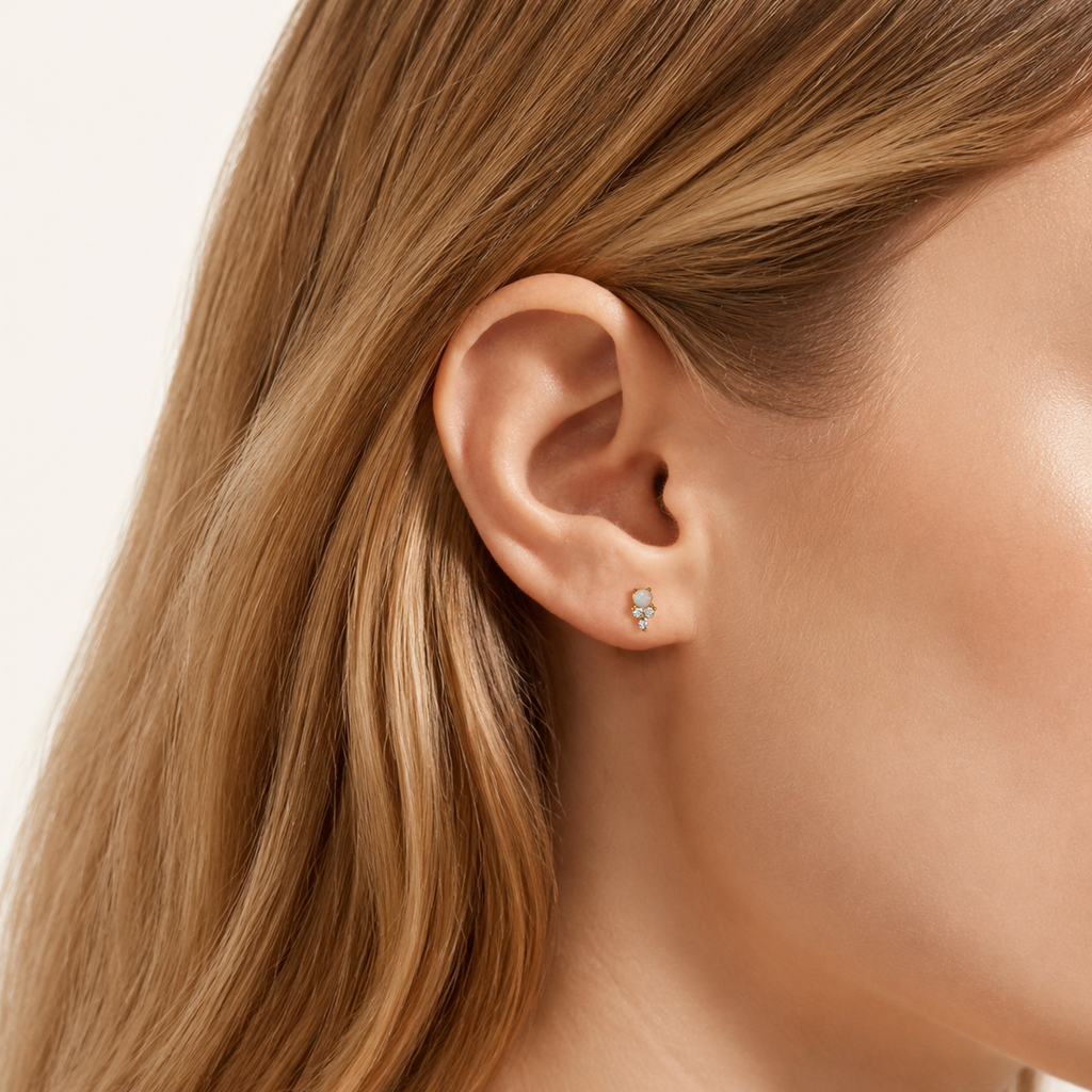 Sterling Silver Opal Stud Earrings worn on the ear