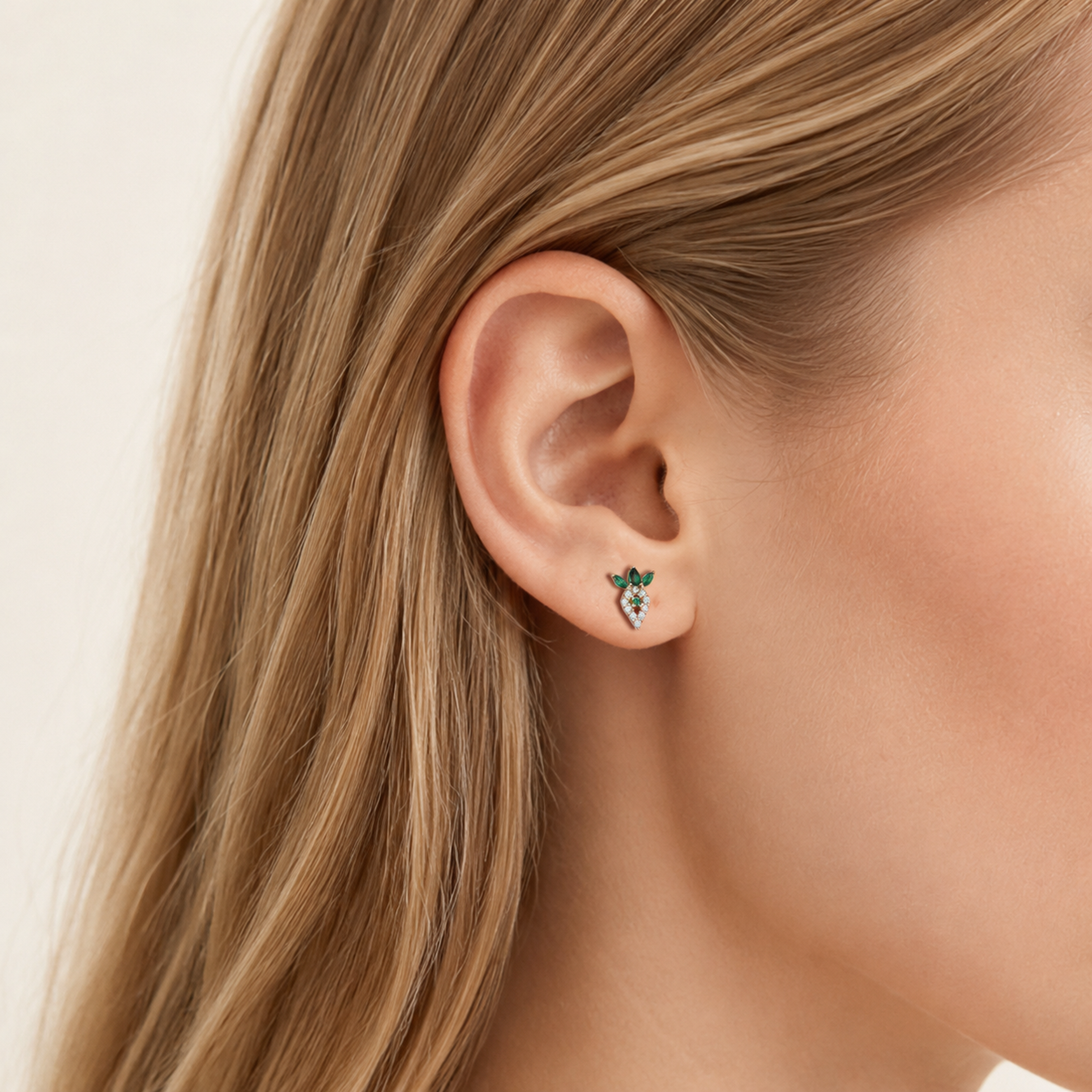 Sterling Silver Emerald-Green Zirconia Flat Back Earrings worn on the ear