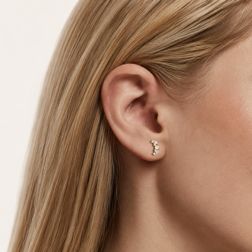 Sterling Silver Zirconia Moon Stud Earrings worn on the ear