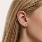 Sterling Silver Zirconia Moon Stud Earrings worn on the ear