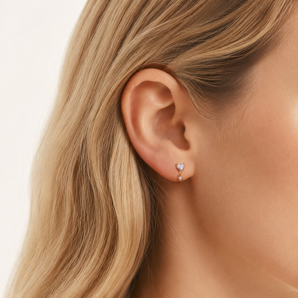 Sterling Silver Zirconia Heart Drop Flat Back Earrings worn on the ear