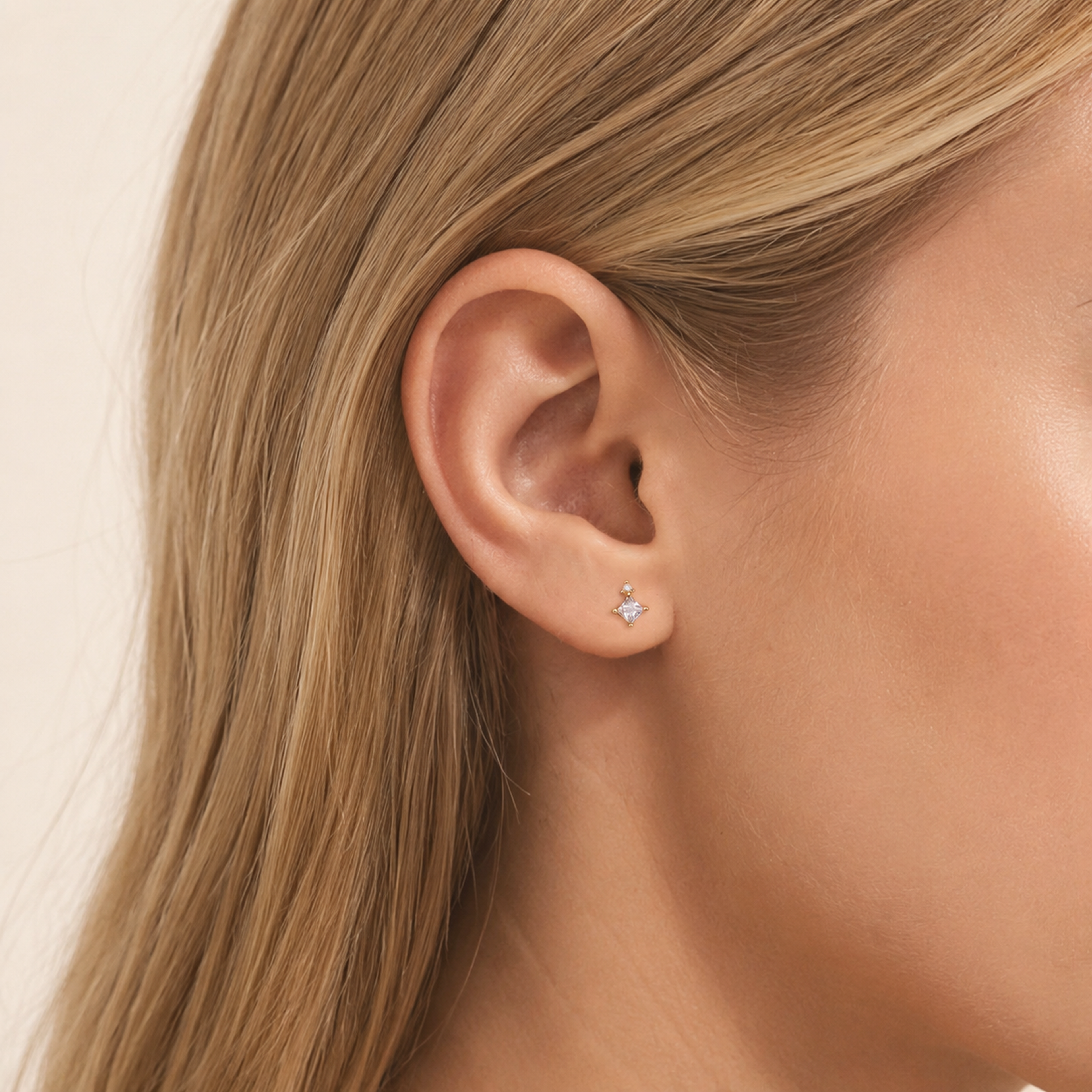 Sterling Silver Star Zirconia Flat Back Earrings worn on the ear