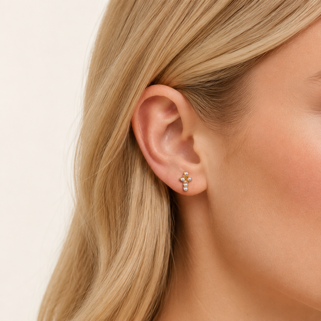 Sterling Silver Pearl Stud Earrings worn on the ear
