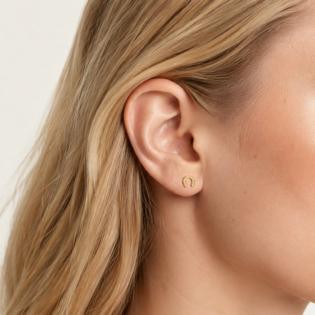 Sterling Silver U-Shape Minimalist Stud Earrings worn on the ear