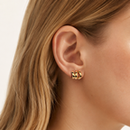 Sterling Silver French Open Circle Stud Earrings worn on the ear
