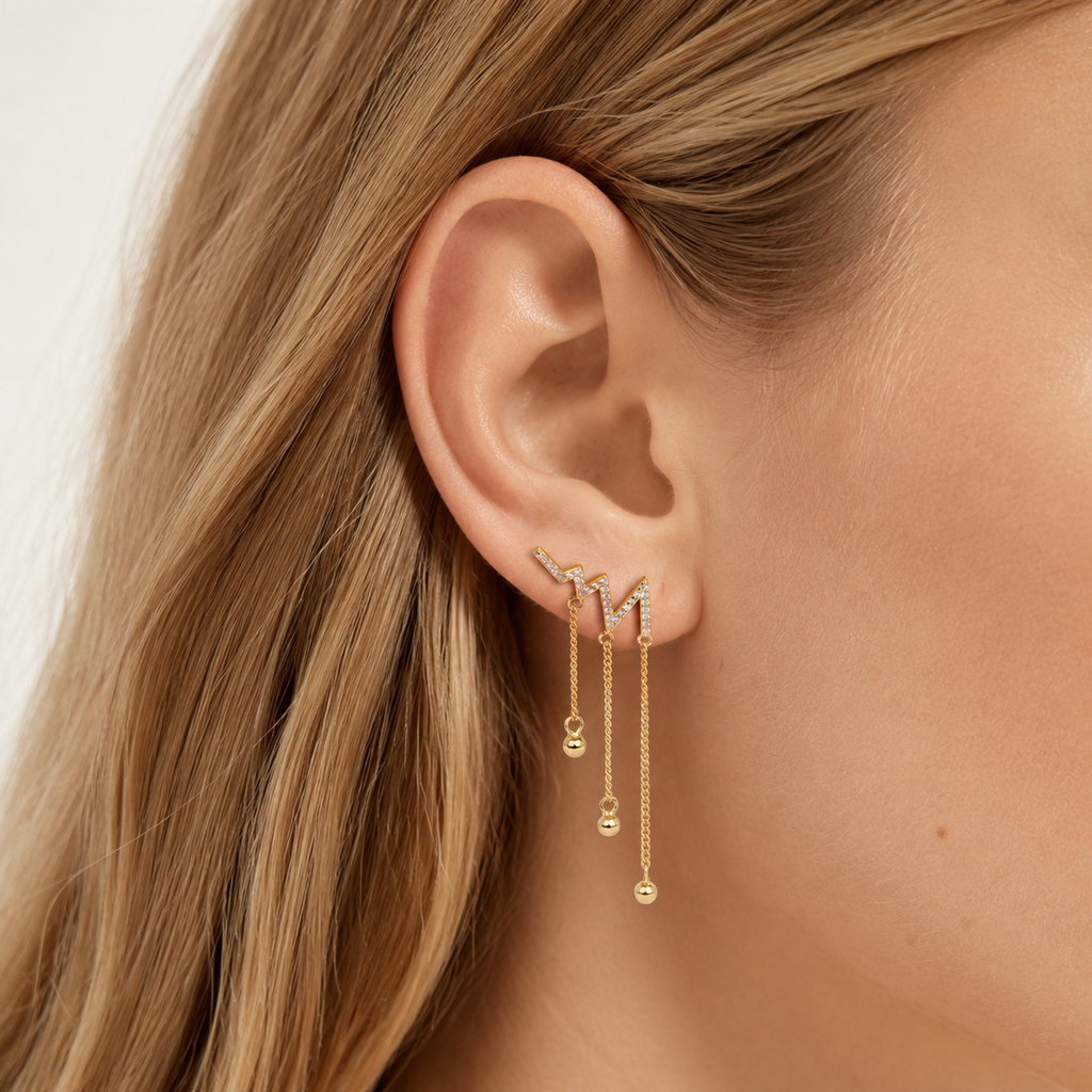 Sterling Silver Heartbeat Zirconia Drop Stud Earrings worn on the ear