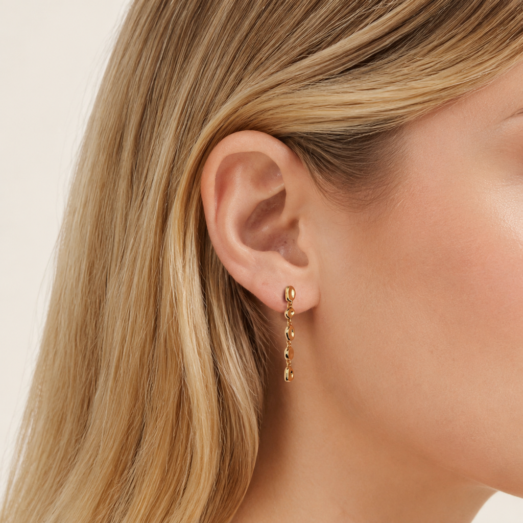 Sterling Silver Hammered Bead Drop Stud Earrings worn on the ear