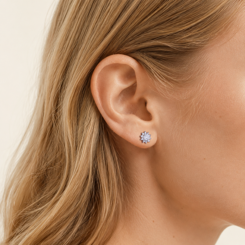 Sterling Silver Moissanite Sunflower Stud Earrings worn on the ear