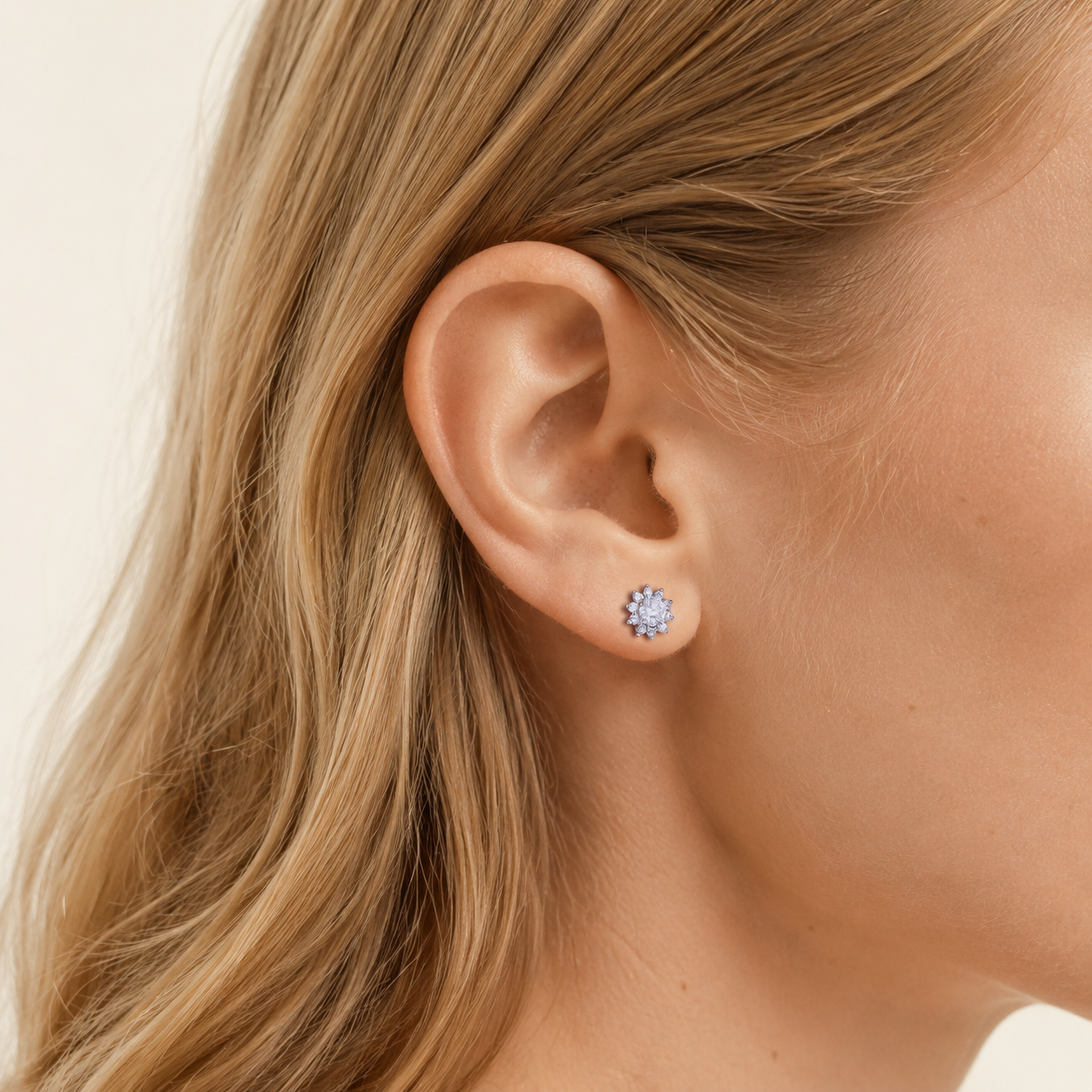 Sterling Silver Moissanite Sunflower Stud Earrings worn on the ear