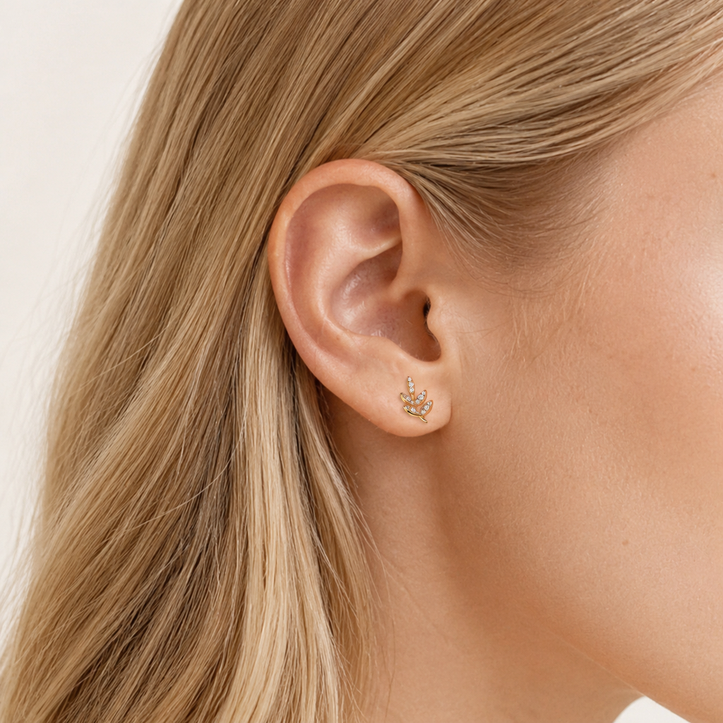 Sterling Silver Round Zirconia Solitaire Stud Earrings worn on the ear