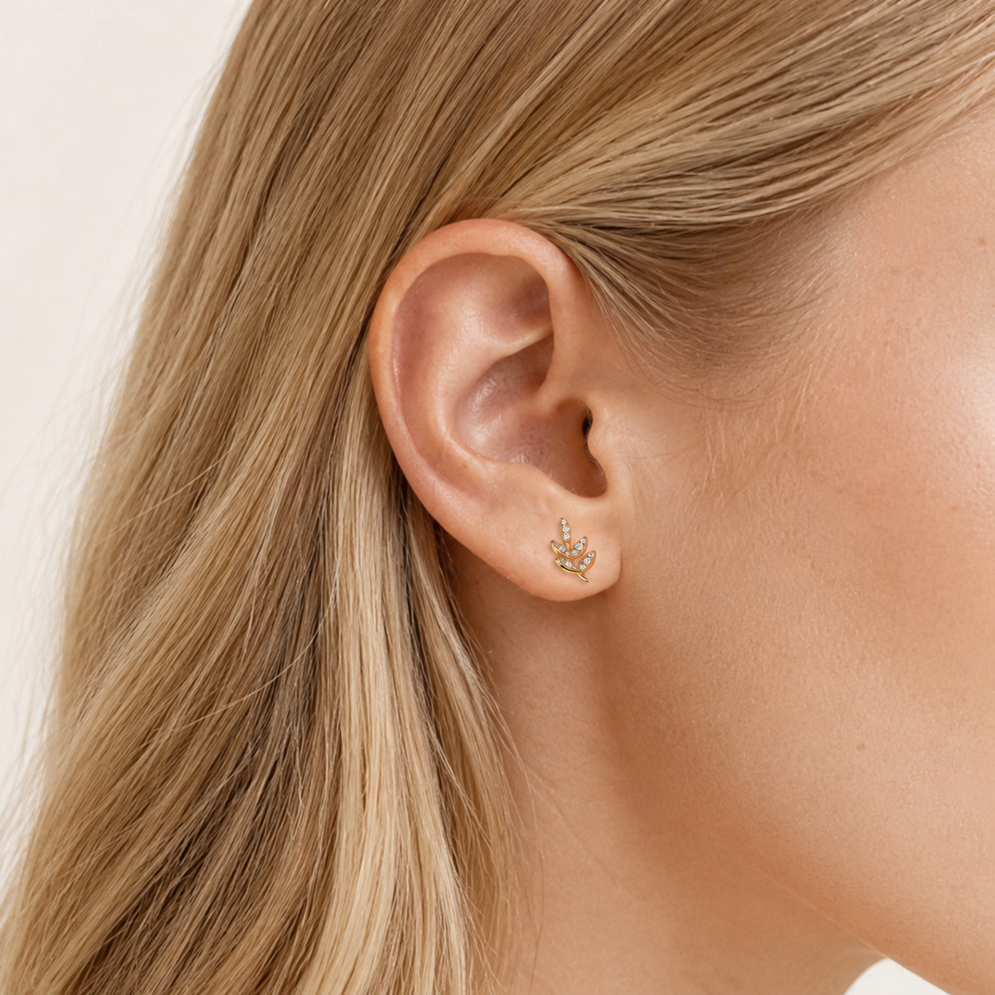 Sterling Silver Round Zirconia Solitaire Stud Earrings worn on the ear