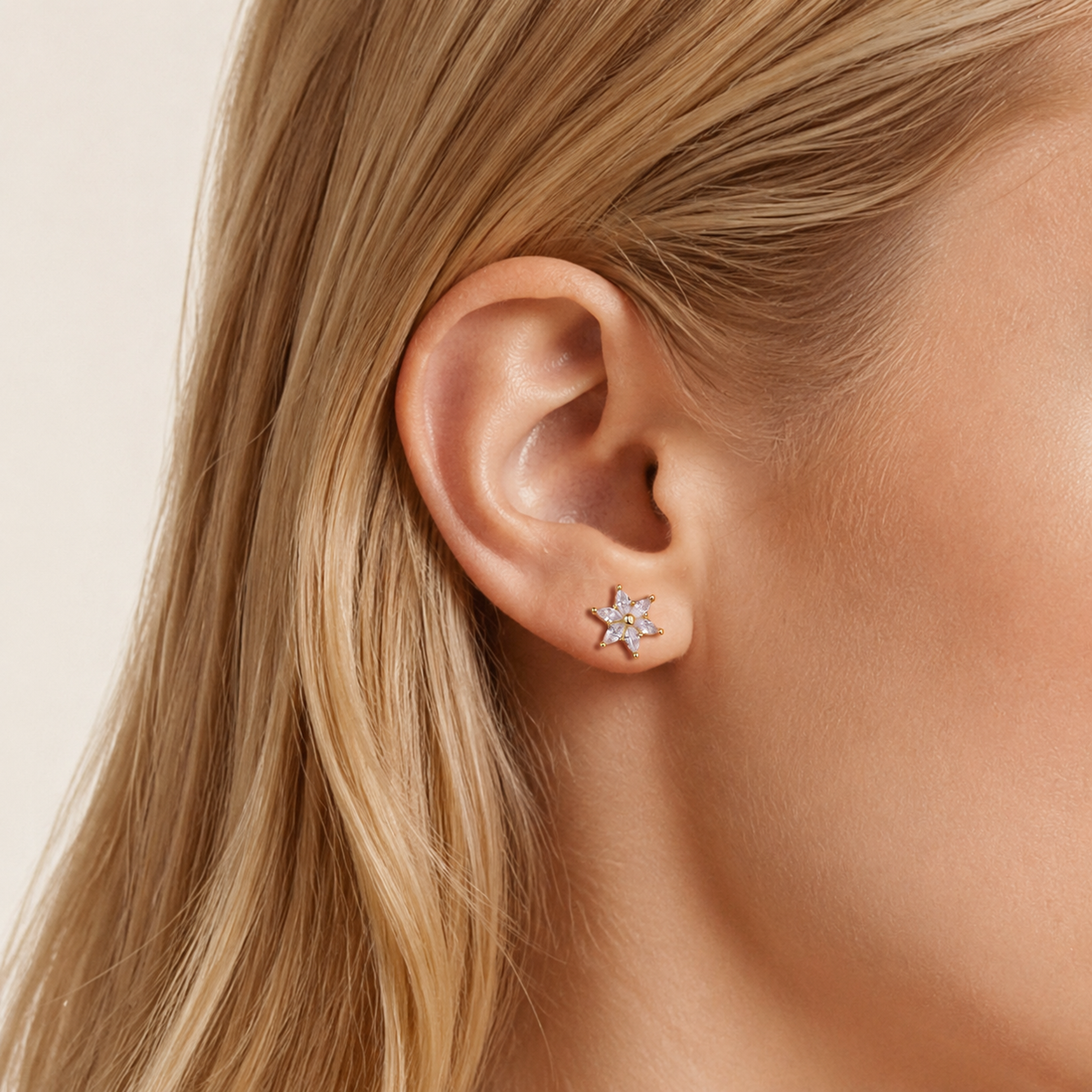 Sterling Silver Zirconia Flower Flat Back Earrings worn on the ear