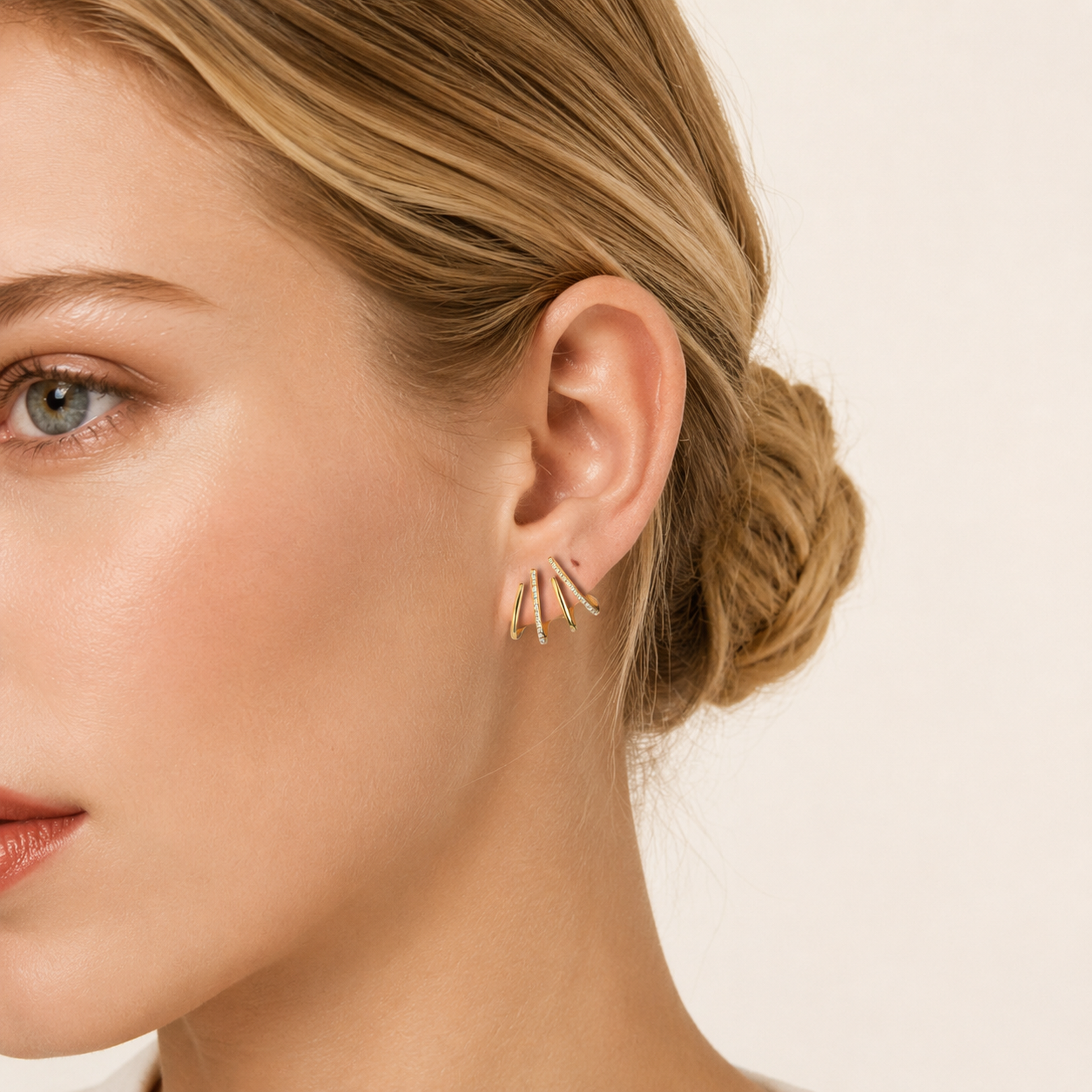 Sterling Silver Four-Prong Zirconia Stud Earrings worn on the ear