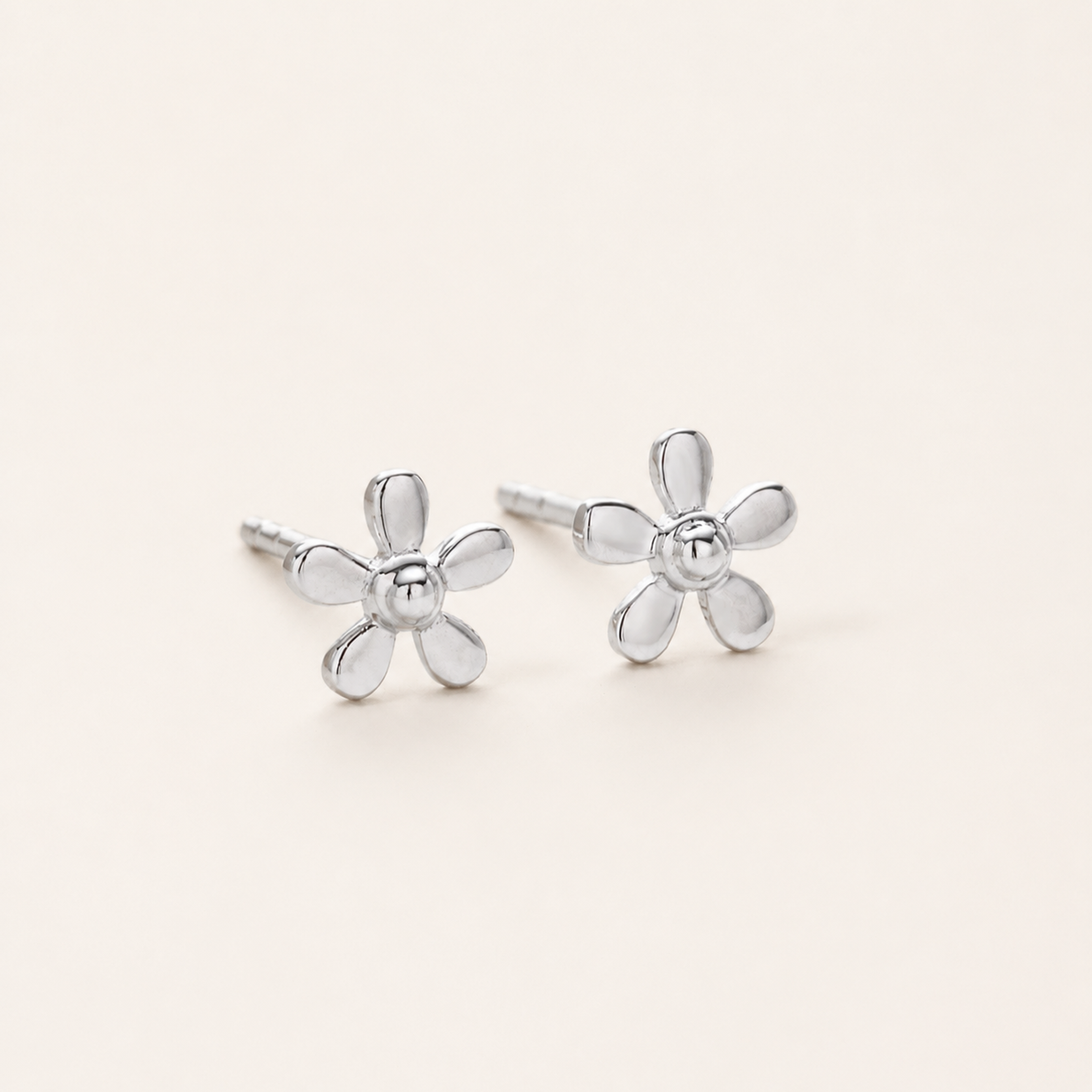Sterling Silver Mini Flower Stud Earrings detail view