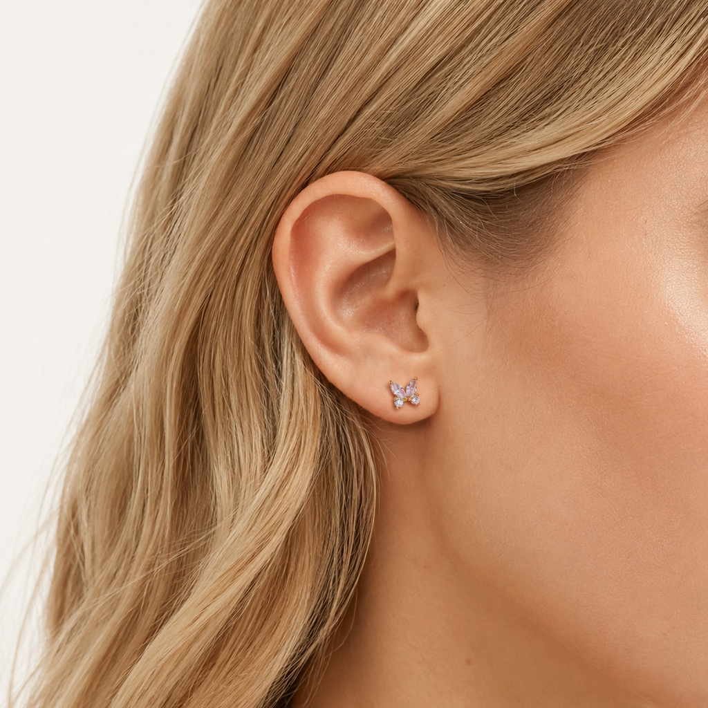 Sterling Silver Butterfly Zirconia Flat Back Earrings worn on the ear