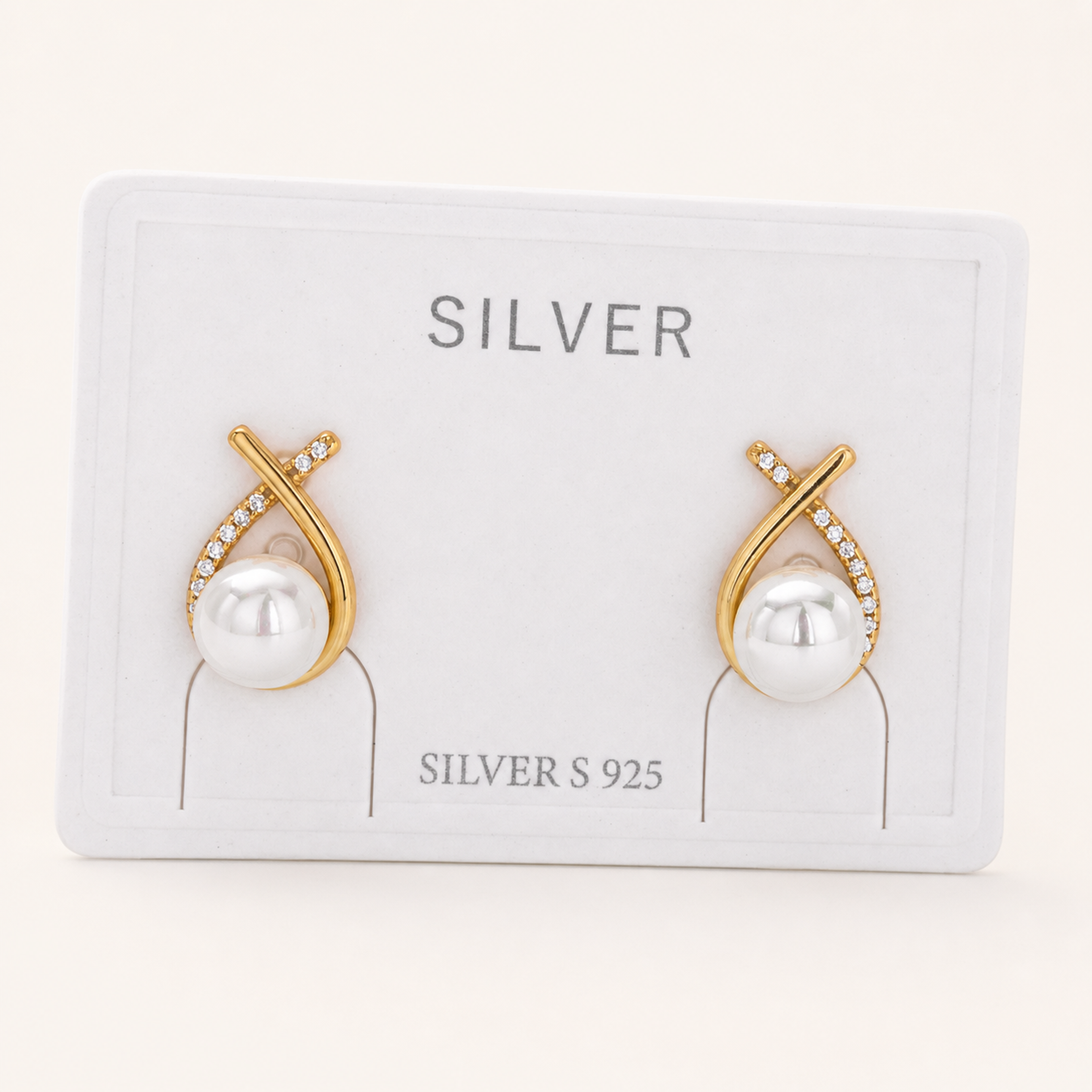 Sterling Silver Pearl And Crossover Zirconia Stud Earrings detail