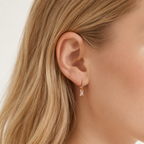Sterling Silver Geometric Zirconia Hoop Earrings worn on the ear
