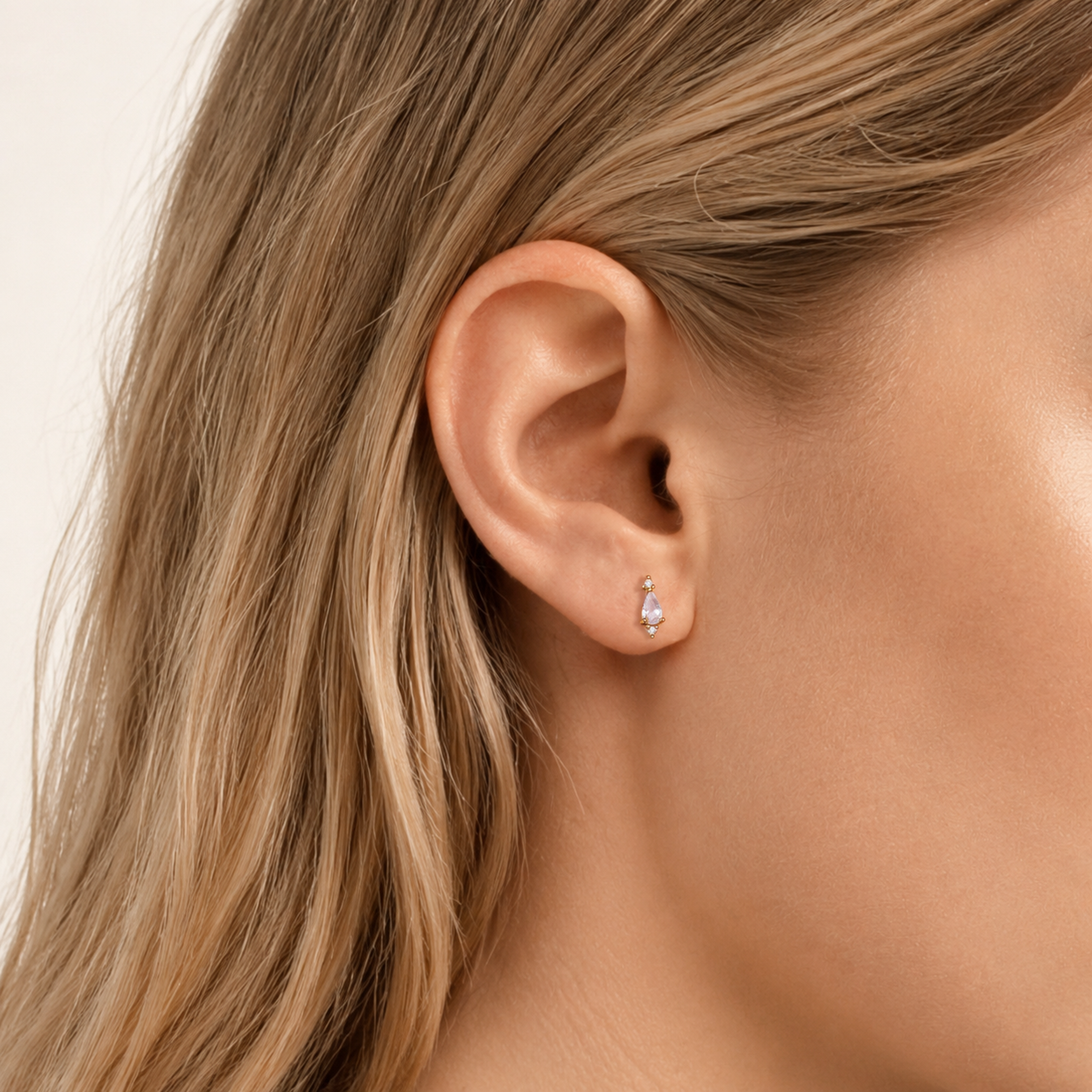 Sterling Silver Teardrop Zirconia Flat Back Earrings worn on the ear