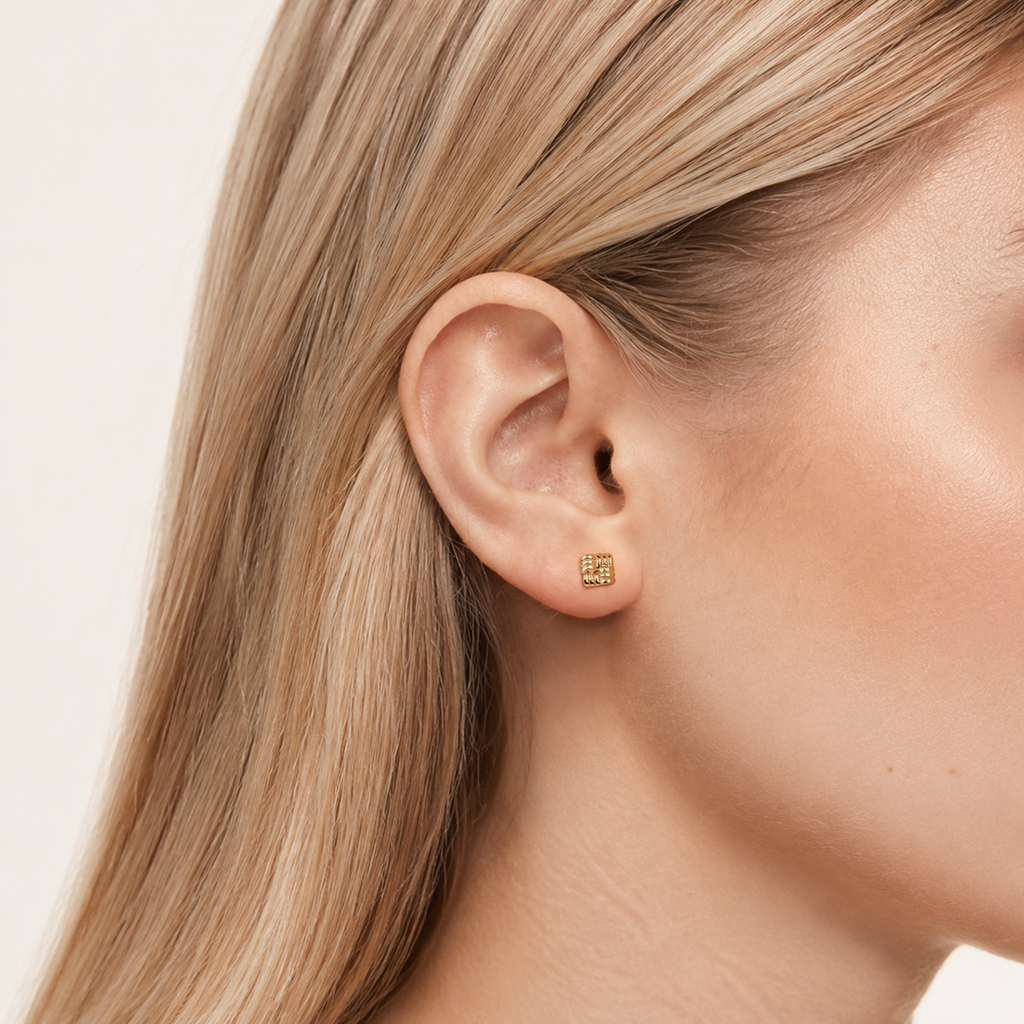 Sterling Silver Textured Square Flat Back Earrings worn on the ear