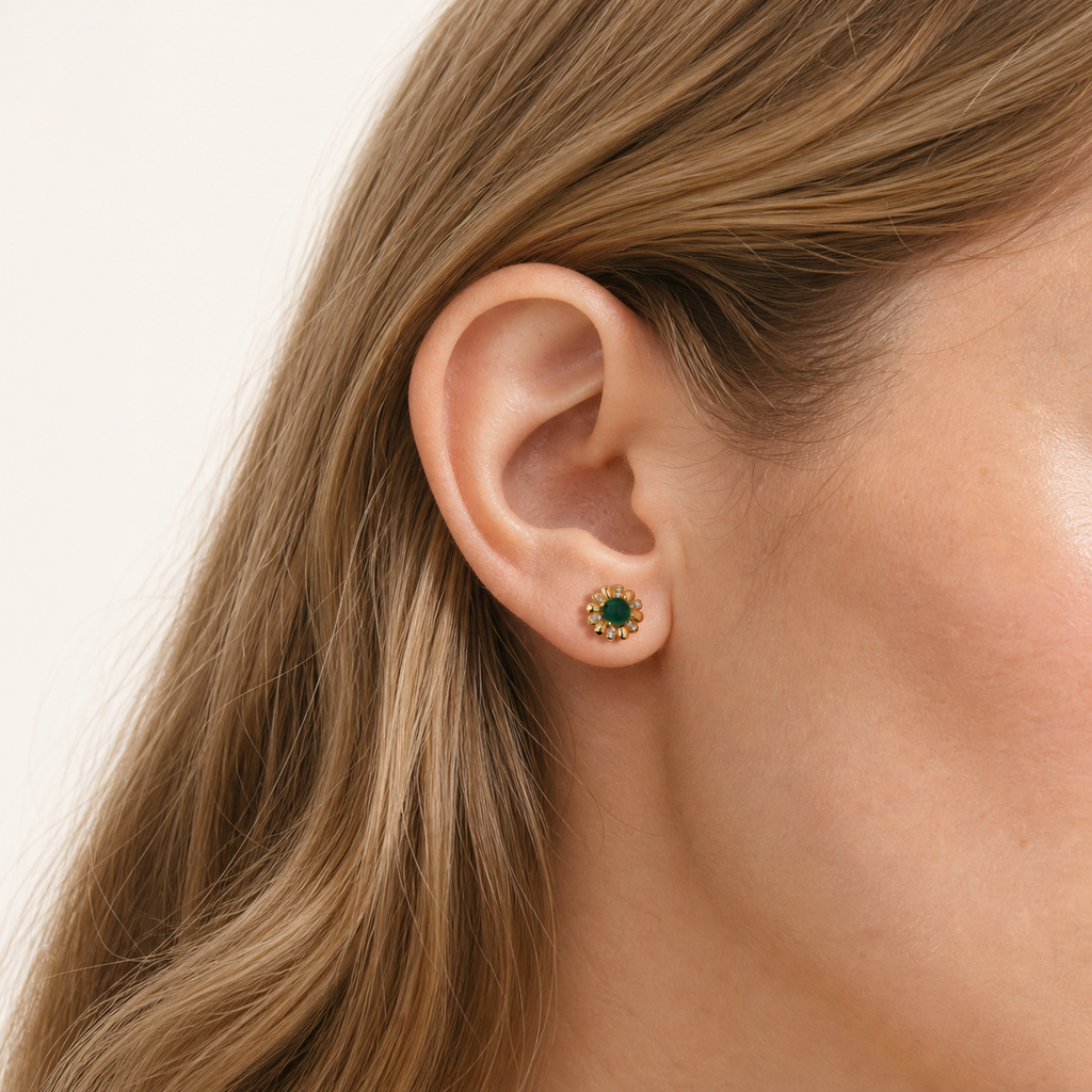 Sterling Silver Green Zirconia Flower Stud Earrings worn on the ear