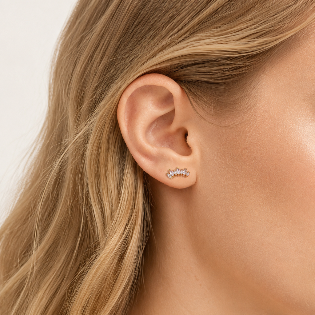 Sterling Silver Two-Tone Zirconia Crown Flat Back Earrings worn on the ear