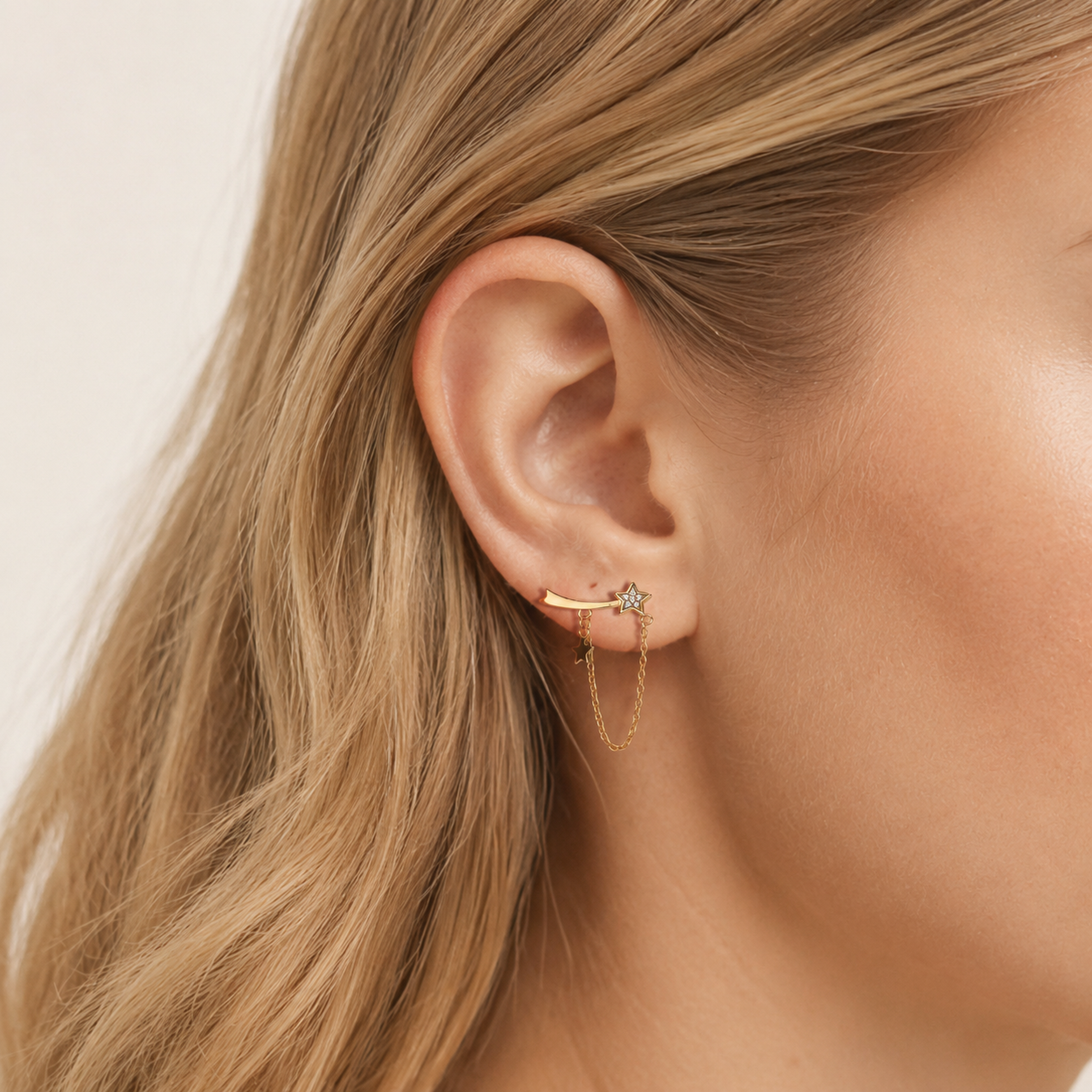 Sterling Silver Star Zirconia Chain Drop Stud Earrings worn on the ear