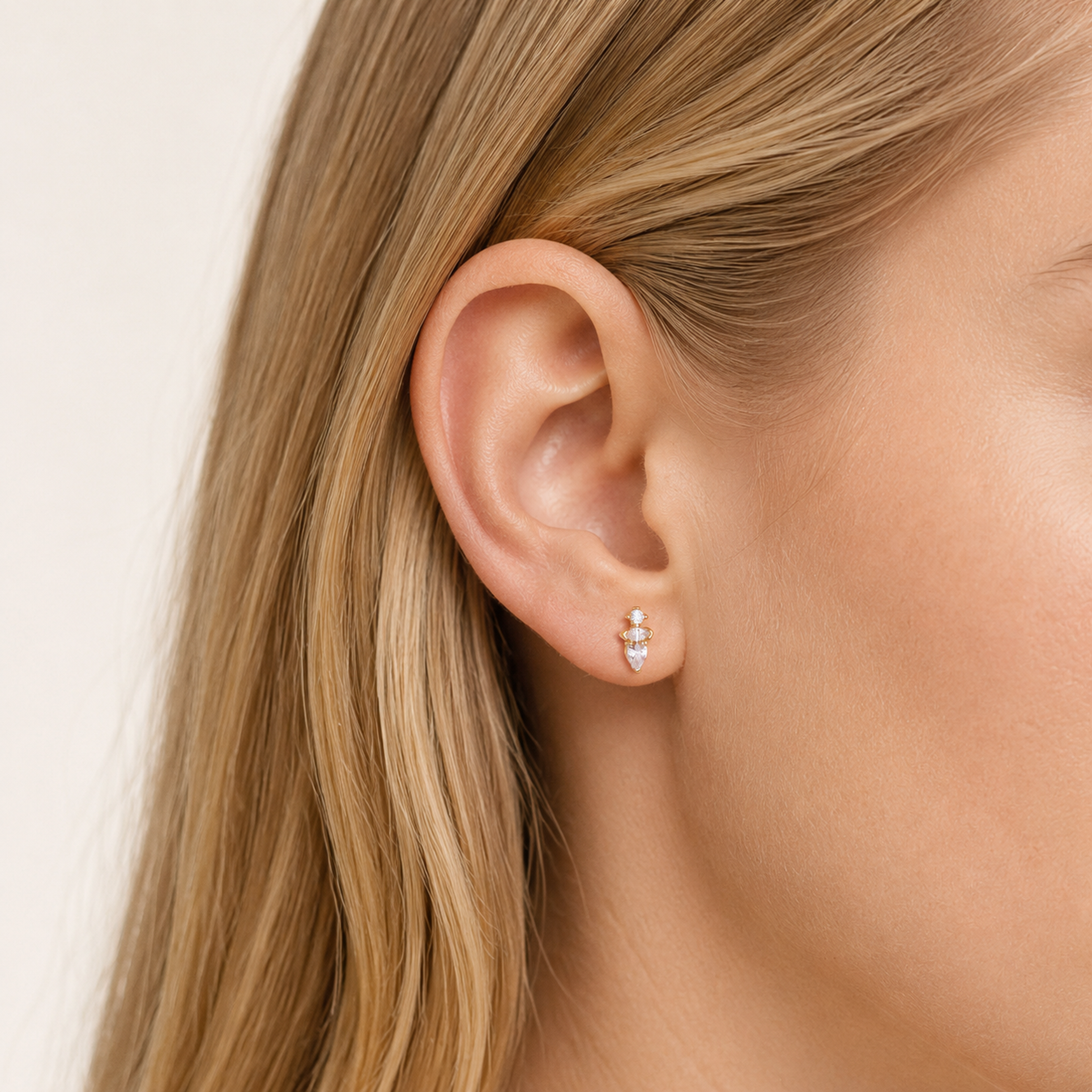 Sterling Silver Teardrop Zirconia Flat Back Earrings worn on the ear