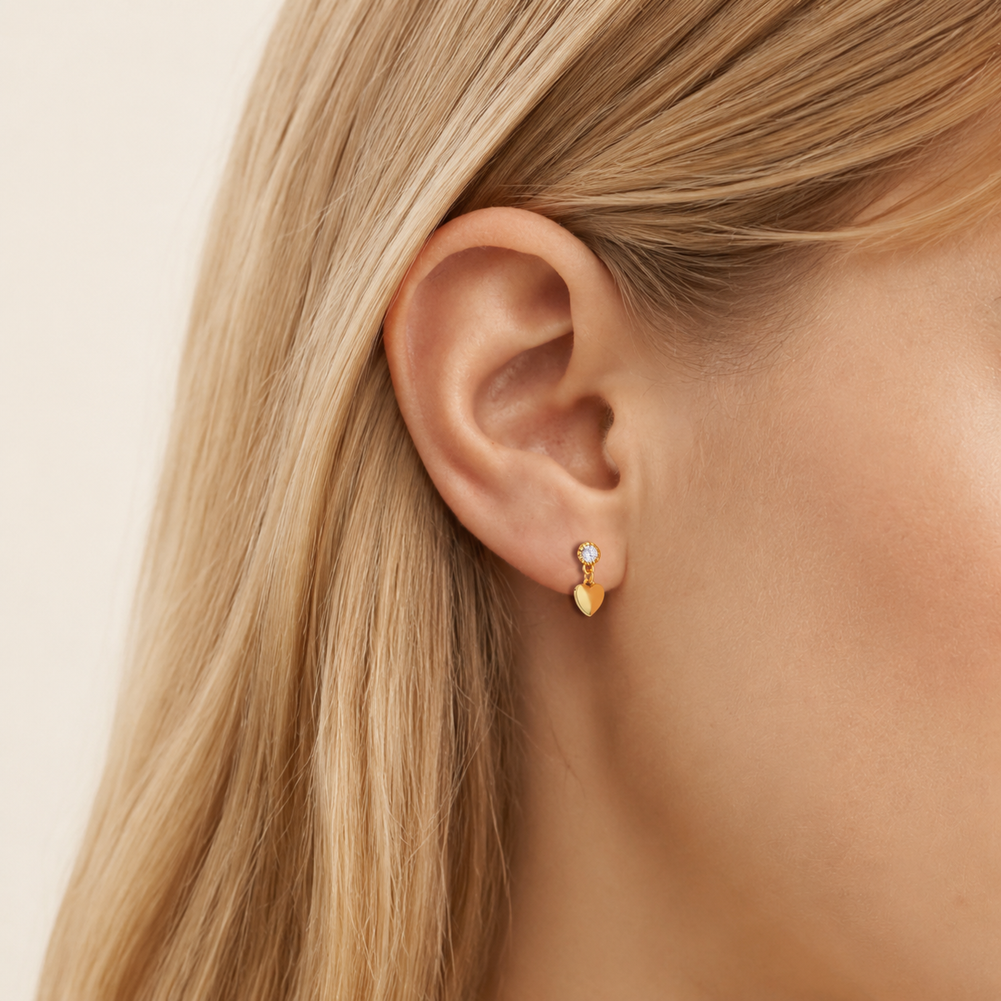 Sterling Silver Zirconia Heart Stud Earrings worn on the ear