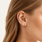 Sterling Silver Zirconia Leaf Drop Flat Back Earrings worn on the ear