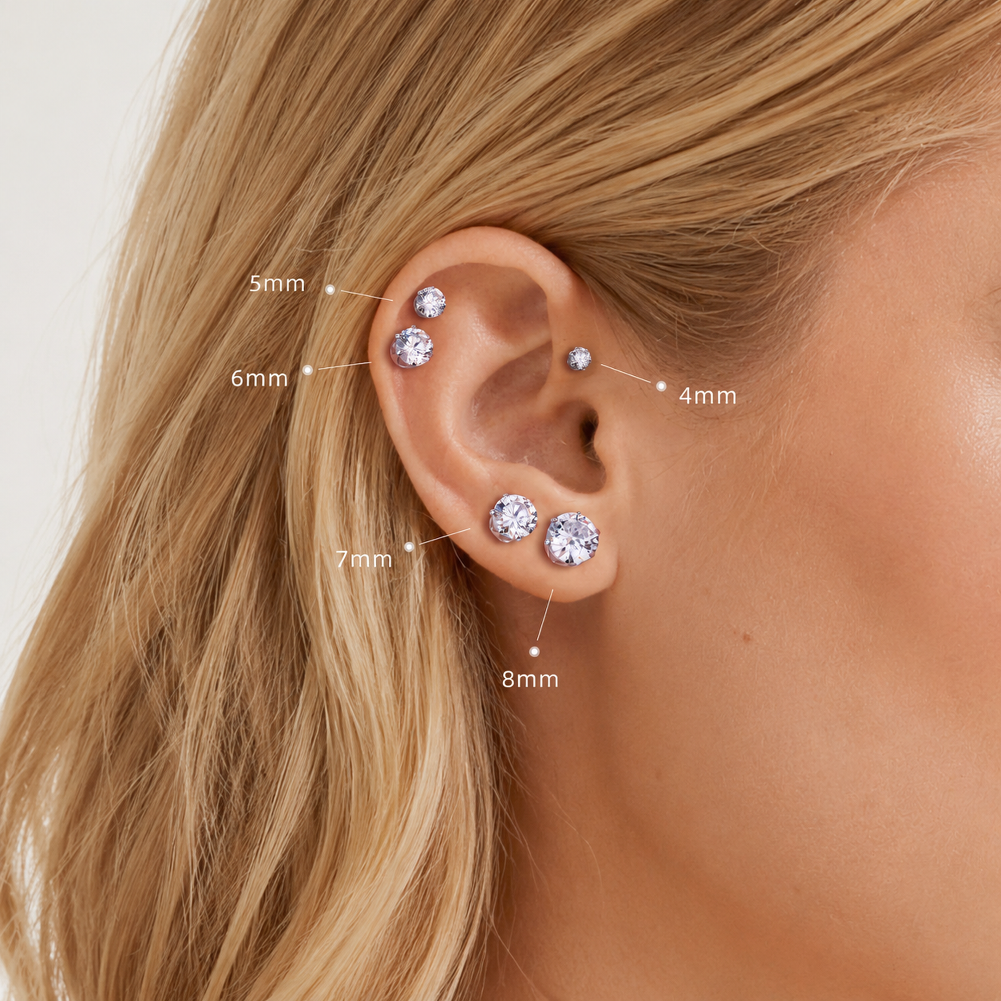 Sterling Silver Six-Prong Zirconia Stud Earrings worn on the ear