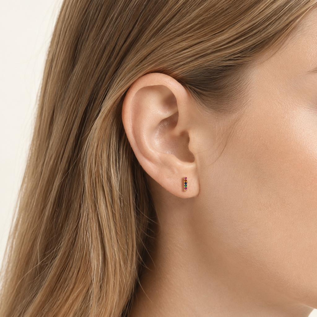Sterling Silver Rainbow Rectangle Zirconia Stud Earrings worn on the ear