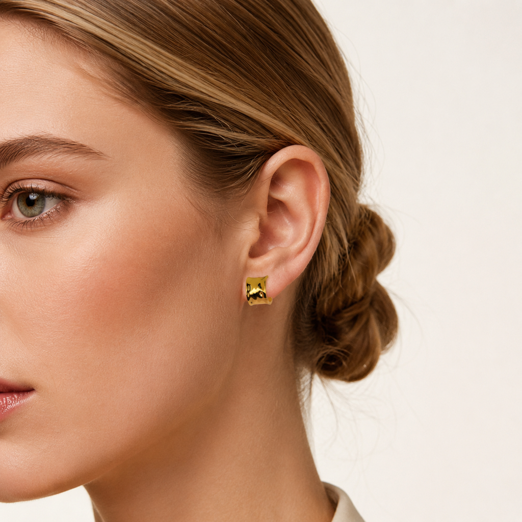 Sterling Silver Chunky C-Shape Hoop Earrings worn on the ear
