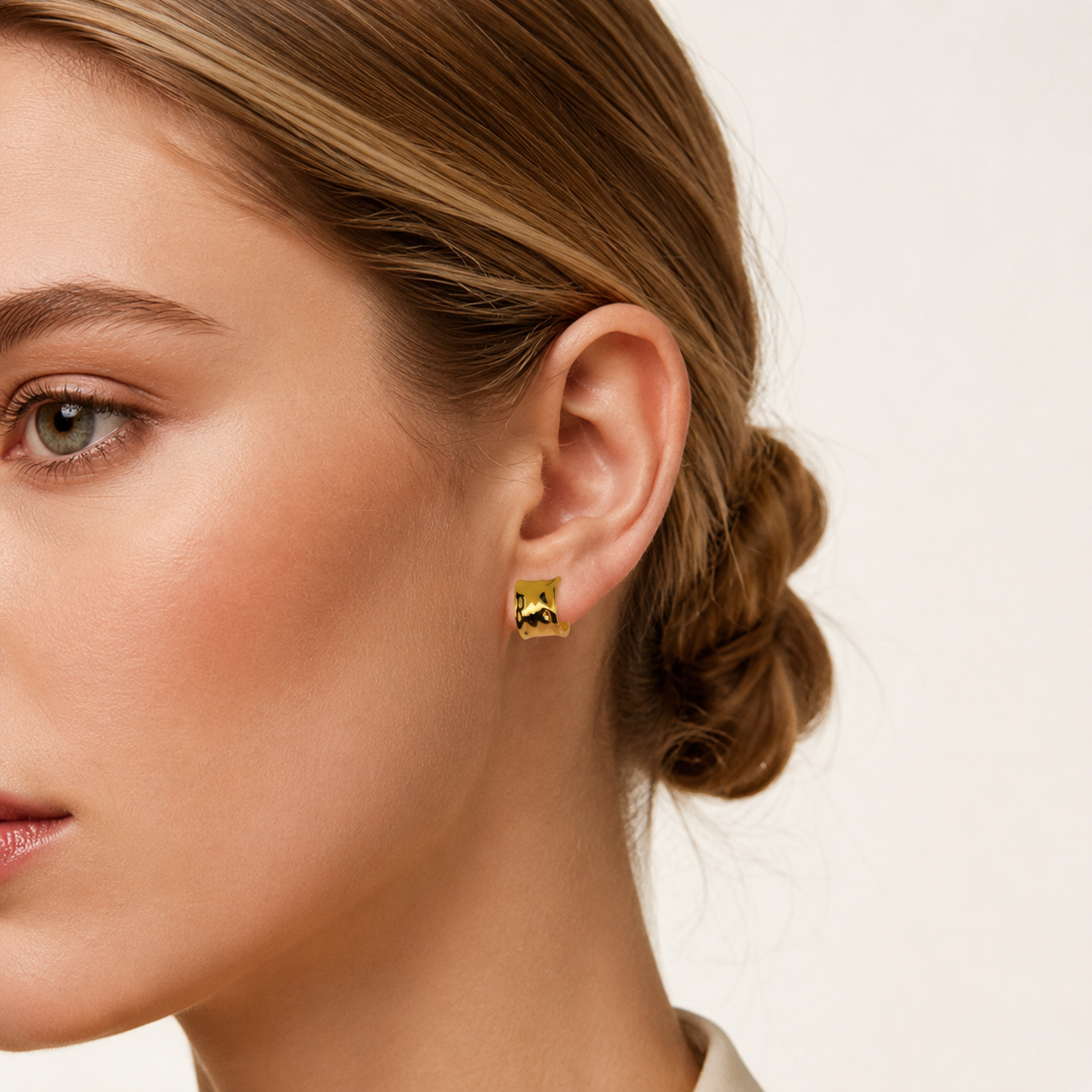 Sterling Silver Chunky C-Shape Hoop Earrings worn on the ear