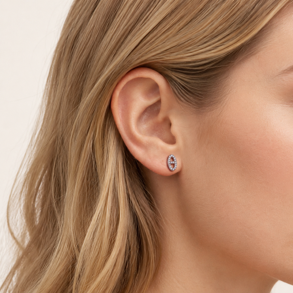 Sterling Silver Pave Initial H Stud Earrings worn on the ear