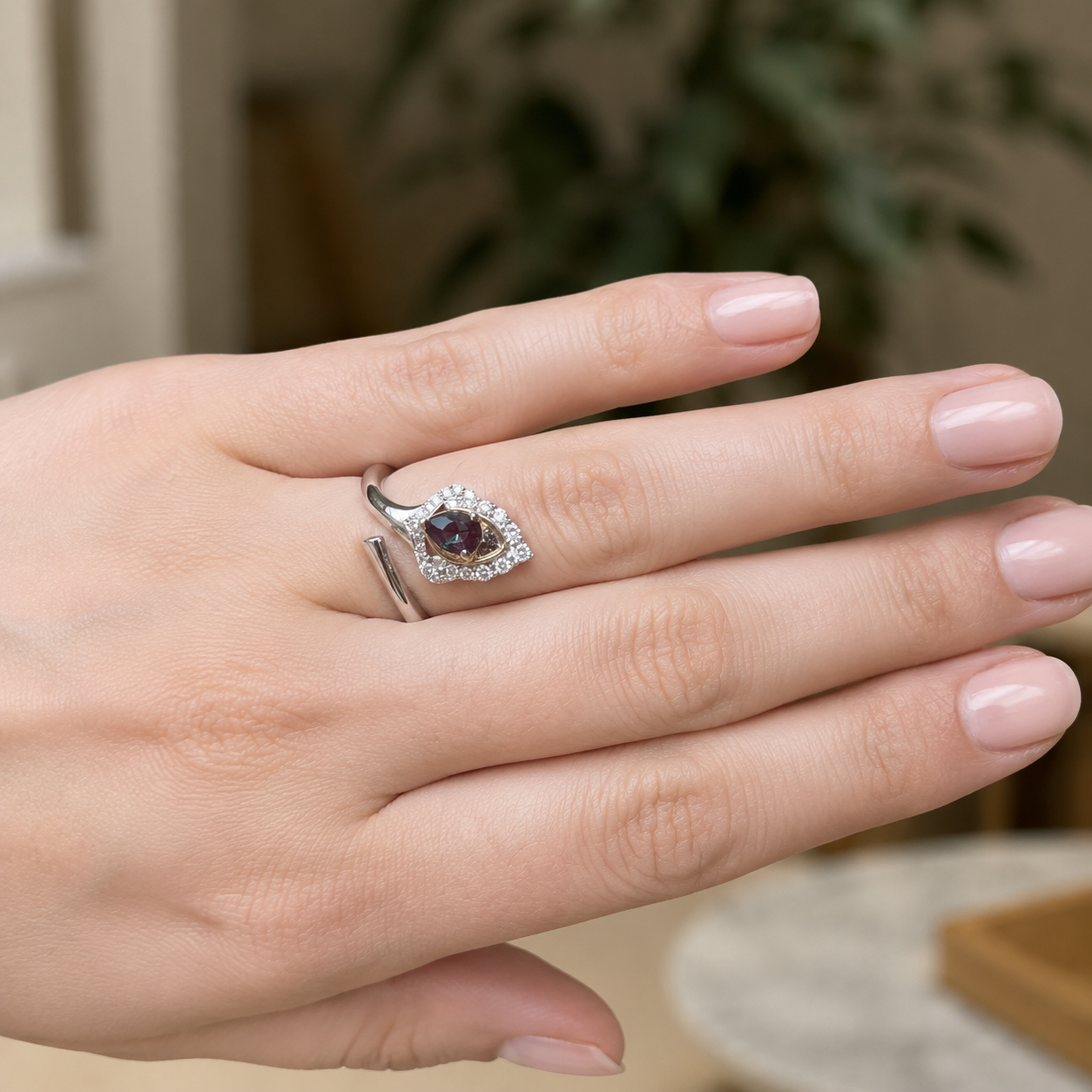 Gilded Plume Lab-Grown Alexandrite Ring worn on hand