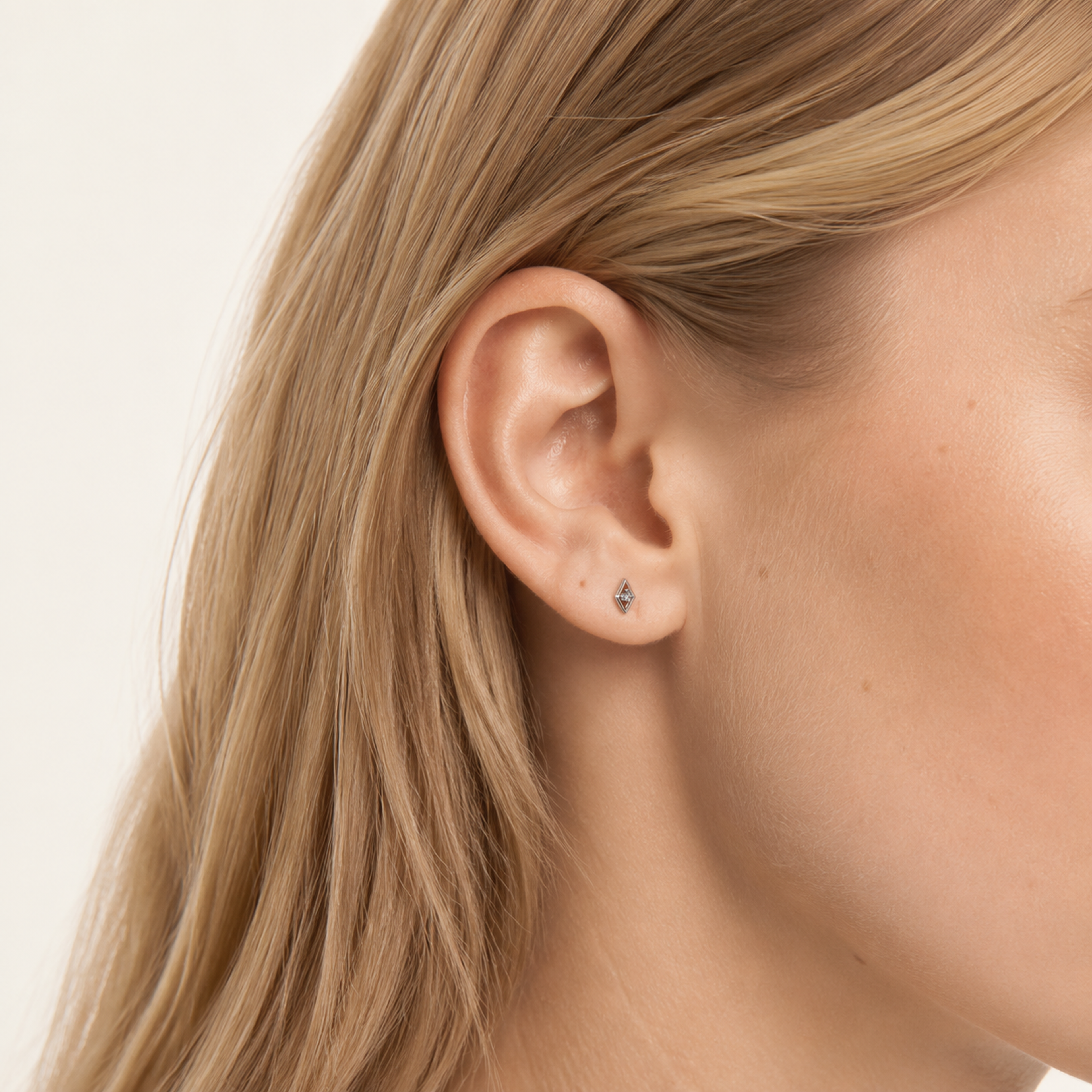 Sterling Silver Rhombus Zirconia Tassel Stud Earrings worn on the ear