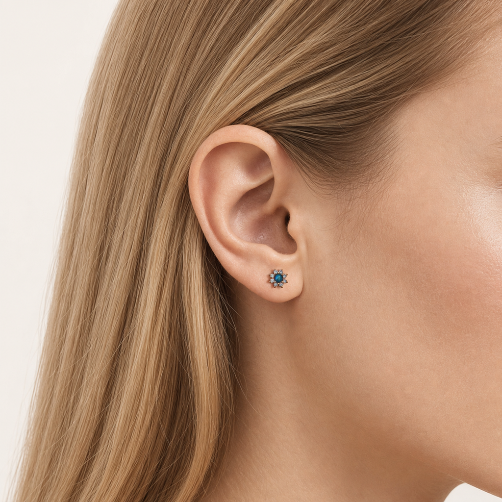 Sterling Silver Opal Sunflower Stud Earrings worn on the ear