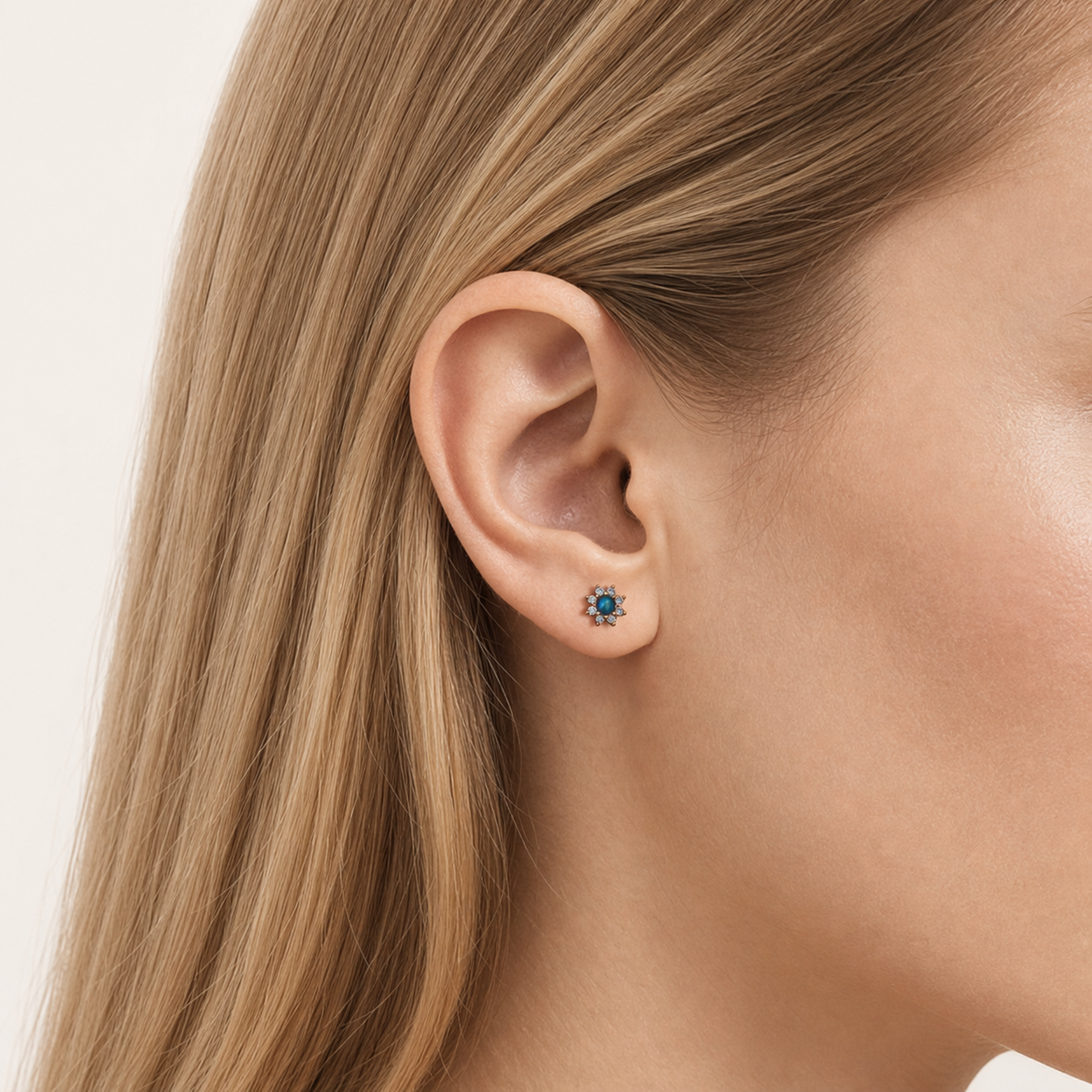 Sterling Silver Opal Sunflower Stud Earrings worn on the ear