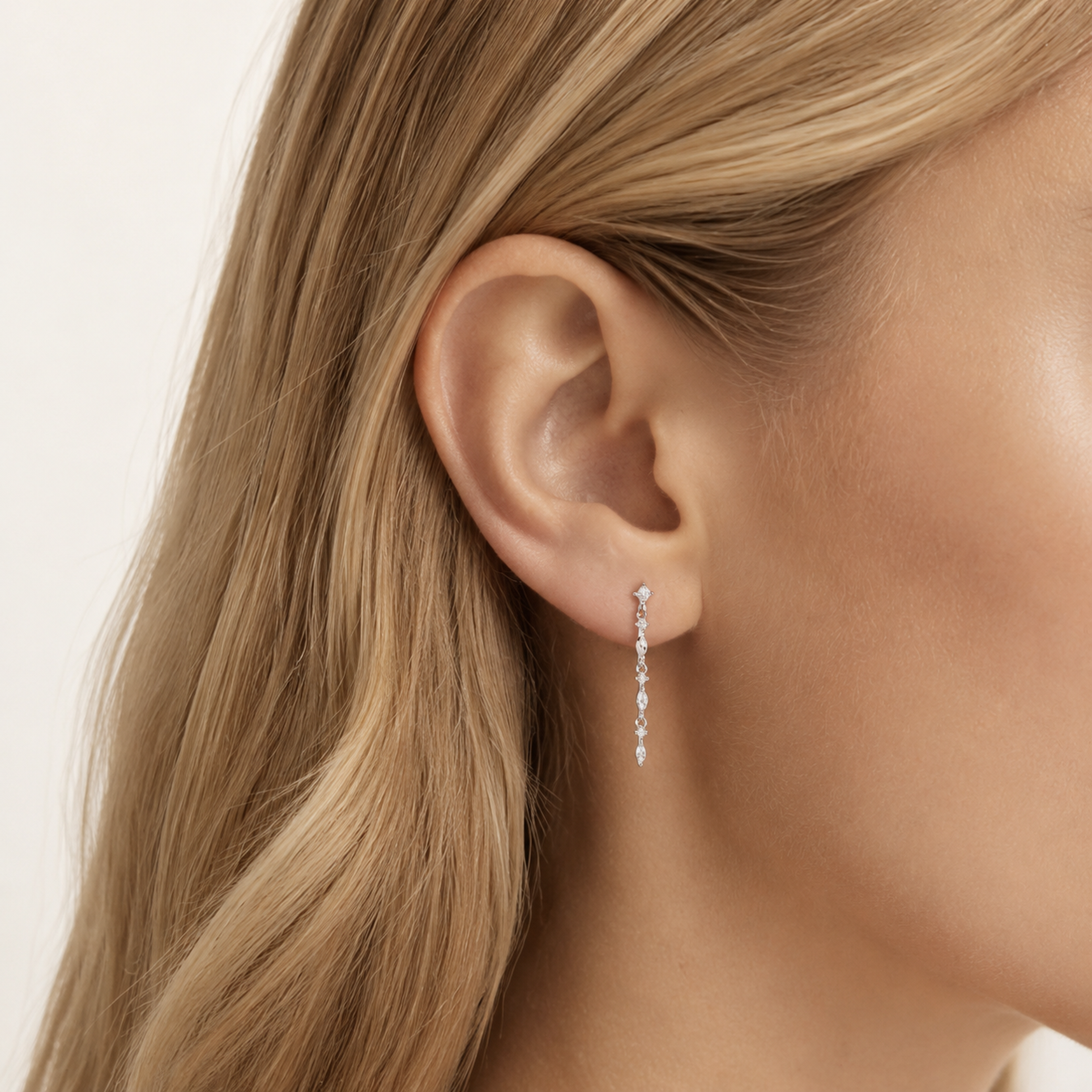 Sterling Silver Zirconia Chain Tassel Drop Stud Earrings worn on the ear