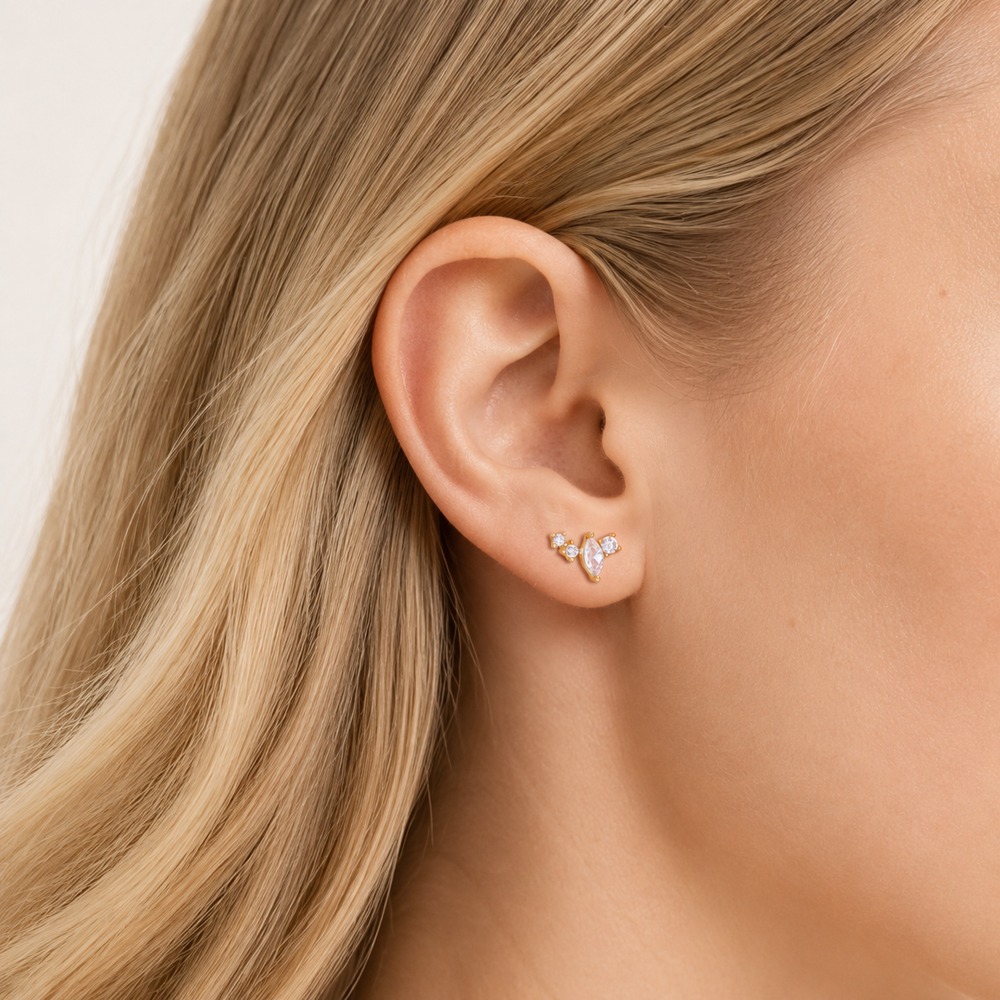 Sterling Silver Sparkling Zirconia Stud Earrings worn on the ear